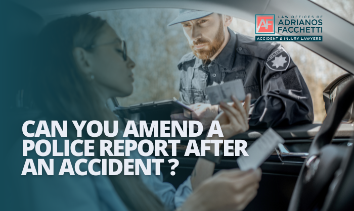 Female driver speaking with California police officer during a car accident report - amend police report guidance