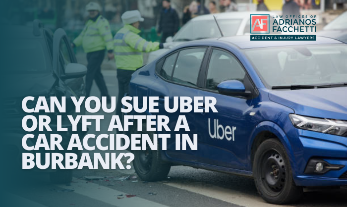 Uber rideshare car pulled over after an accident in Burbank with text asking if you can sue Uber or Lyft after a car crash.