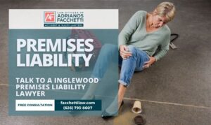 Inglewood premises liability lawyer graphic from the Law Offices of Adrianos Facchetti showing an injured woman on a store floor after a slip and fall, with a free consultation offer and contact information.