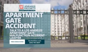 Apartment gate in Los Angeles with banner promoting an apartment gate accident lawyer at the Law Offices of Adrianos Facchetti