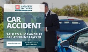Los Angeles car accident lawyer from the Law Offices of Adrianos Facchetti standing beside a crashed car with contact details for a free consultation.