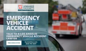 Emergency vehicle accident banner showing a police car light bar and a fire truck in the background for the Law Offices of Adrianos Facchetti, Los Angeles emergency vehicle accident lawyer.