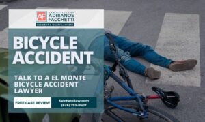 El Monte bicycle accident lawyer image with injured cyclist in a crosswalk