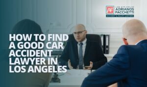 Los Angeles car accident lawyer at the Law Offices of Adrianos Facchetti meeting with clients about a personal injury case