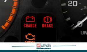 Car brake warning light illuminated on dashboard