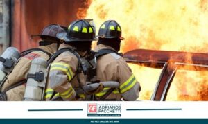 Los Angeles car fire injury lawyer firefighters at burning vehicle
