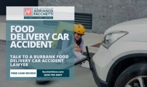 Adrianos Facchetti, Burbank food delivery car accident lawyer, reviewing a DoorDash or Uber Eats injury claim with an injured client.