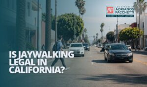 A Pedestrian Crossing A California Street Outside A Marked Crosswalk, Illustrating The Jaywalking Law Changes Under Ab 2147 And Pedestrian Accident Claim Implications Discussed In This Article.